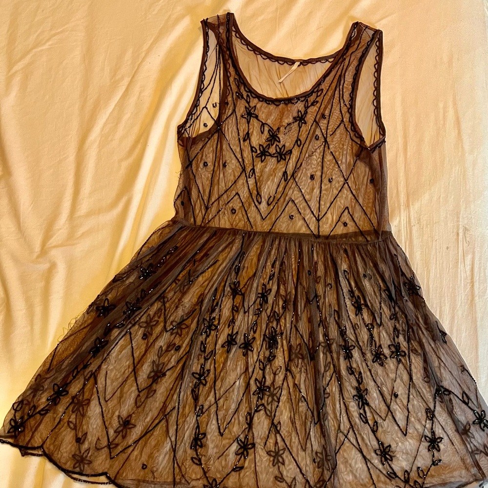 Free People sheer brown beaded dress, very good condition. Size Large.
